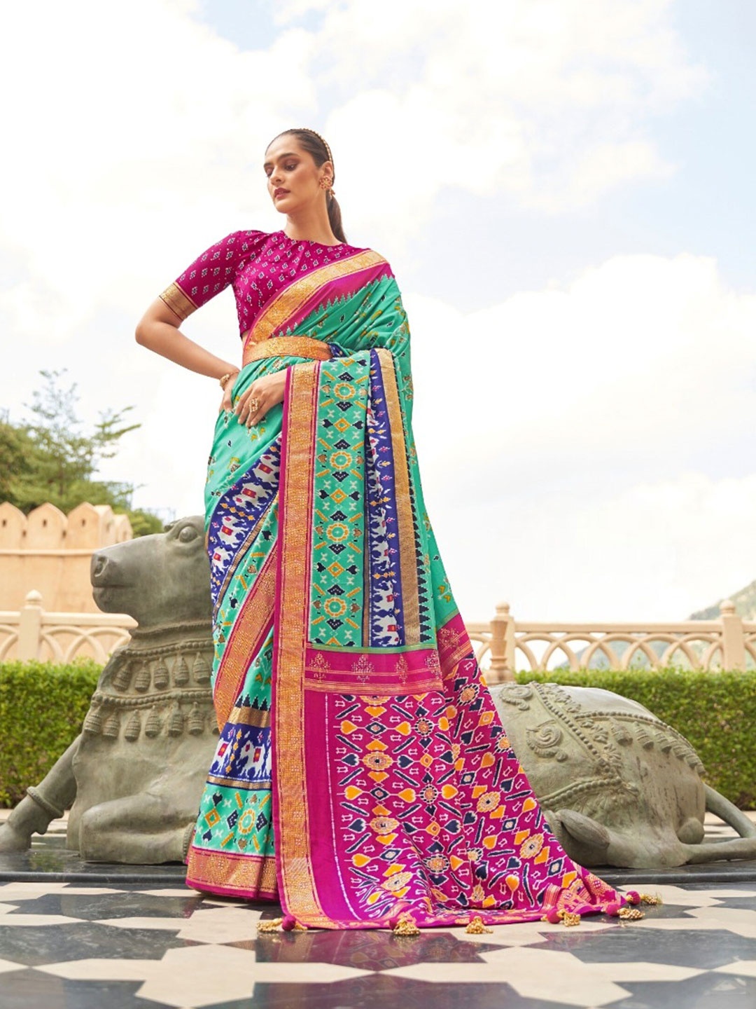 

Mitera Ethnic Motifs Printed Zari Emblished Bordered Patola Saree, Sea green