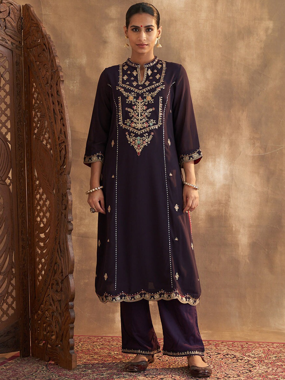 

Lakshita Women Ethnic Motifs Embroidered Thread Work Kurta with Palazzos, Purple