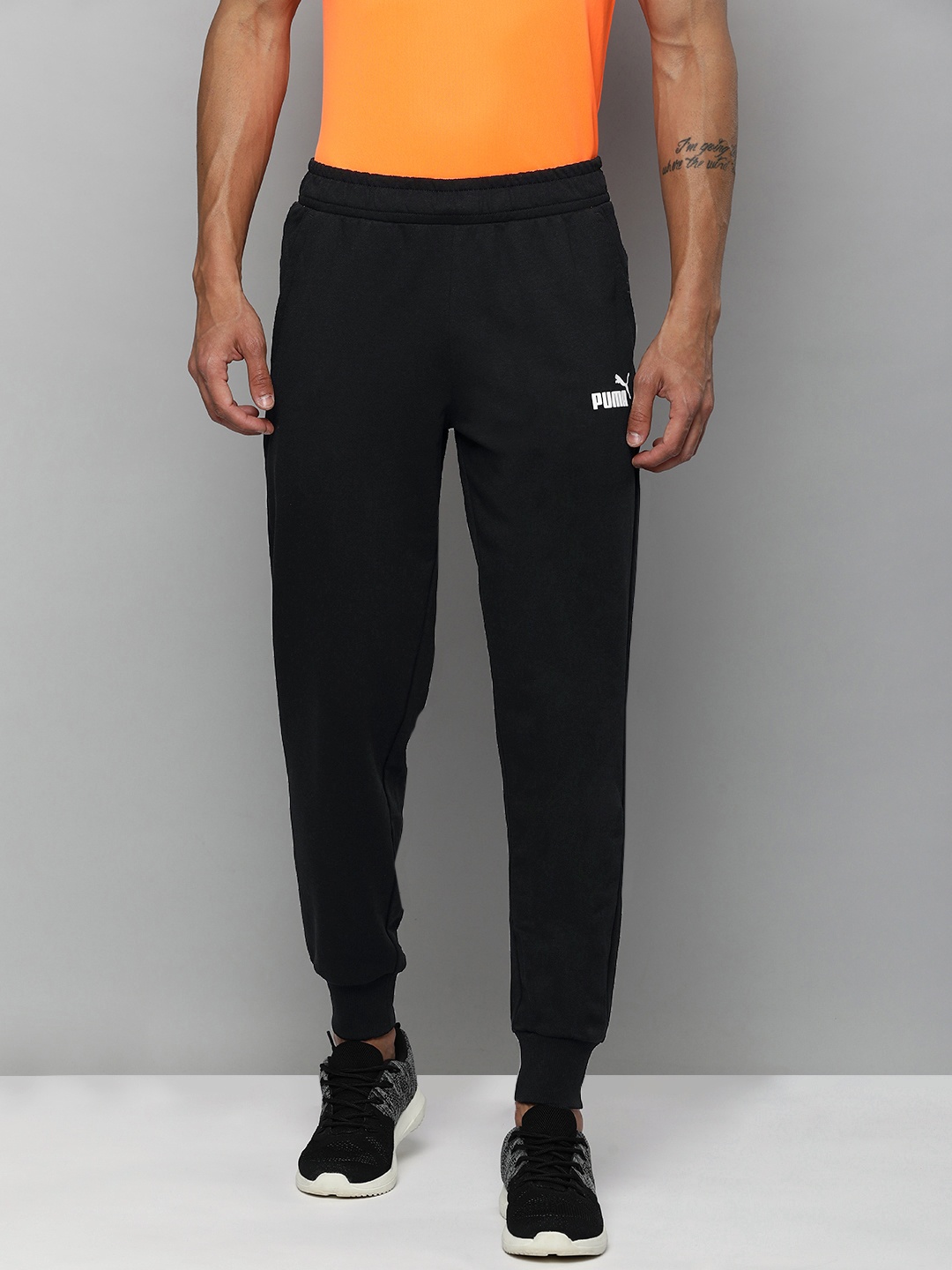

Puma Men ESS Logo Regular Fit Track Pants, Black