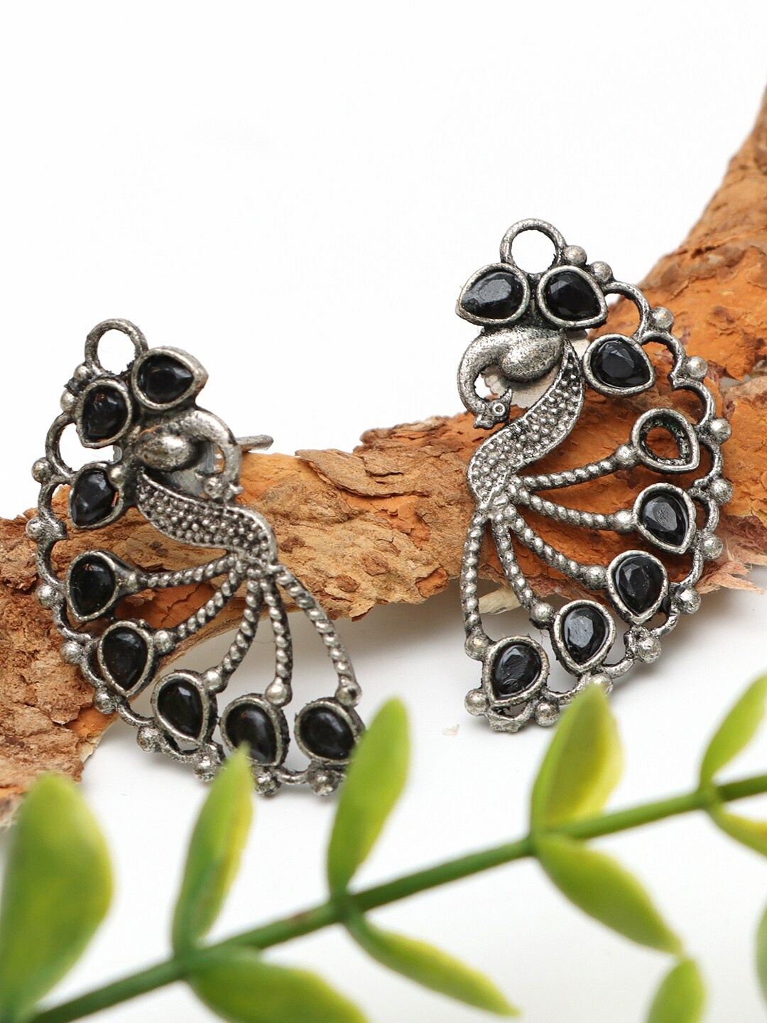 

Ozanoo Brass-Plated Stone Studded Peacock Shaped Stud Earrings, Black
