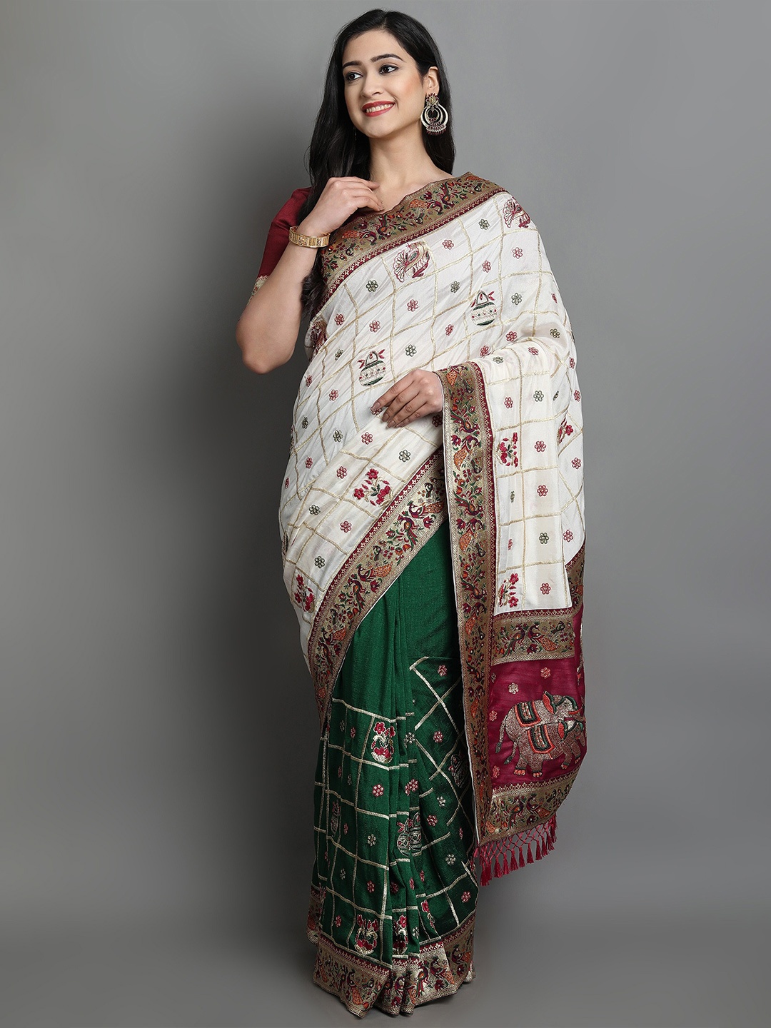 

Ekta Textiles Ethnic Motifs Embroidered Silk Blend Patola Saree, White