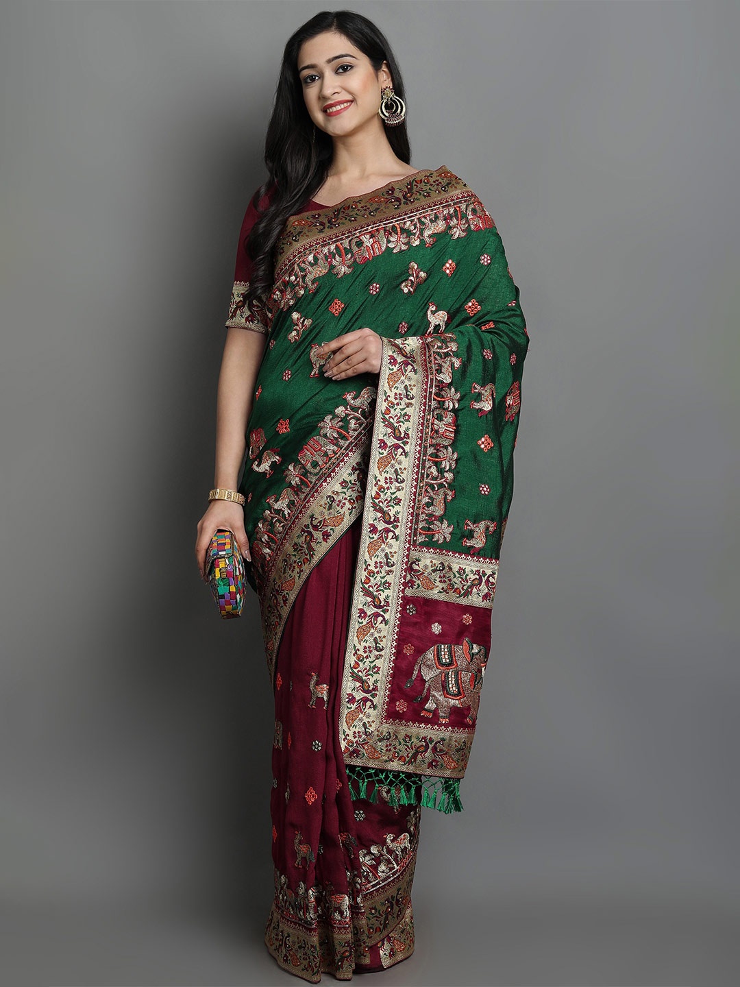 

Ekta Textiles Ethnic Motifs Embroidered Silk Blend Patola Saree, Green