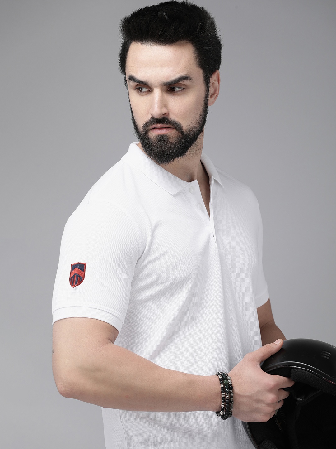 

The Roadster Lifestyle Co. Men Pure Cotton Solid Polo Collar T-shirt, White