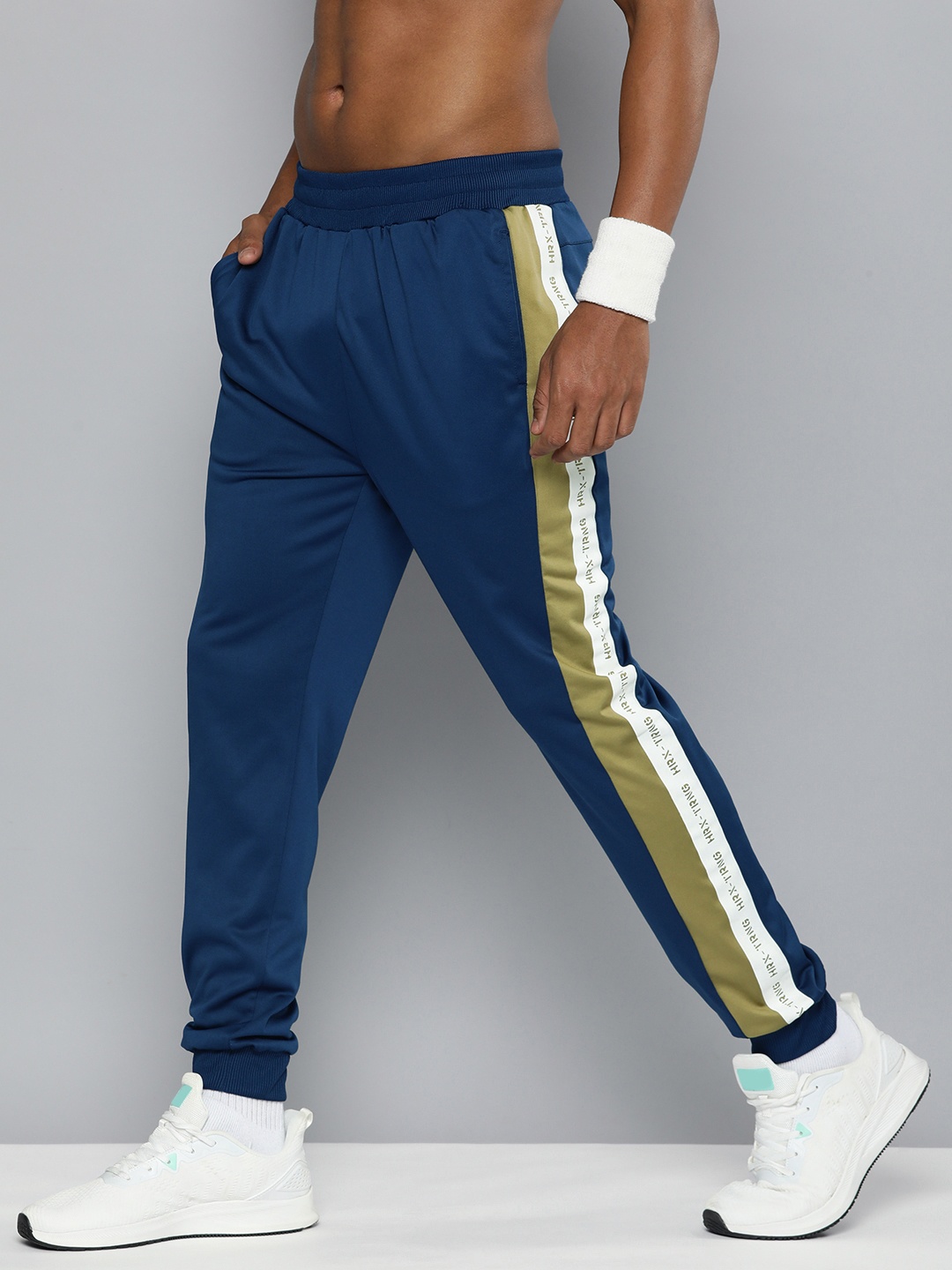 

HRX by Hrithik Roshan Men Brand Logo Printed Side Stripe Detailed Joggers, Blue