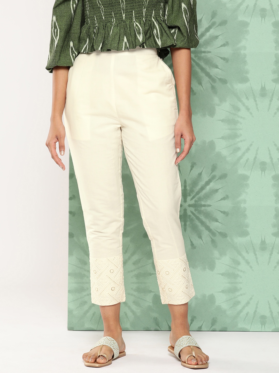 

Libas Women Off White Ethnic Motifs Embroidered Slim Fit Trousers