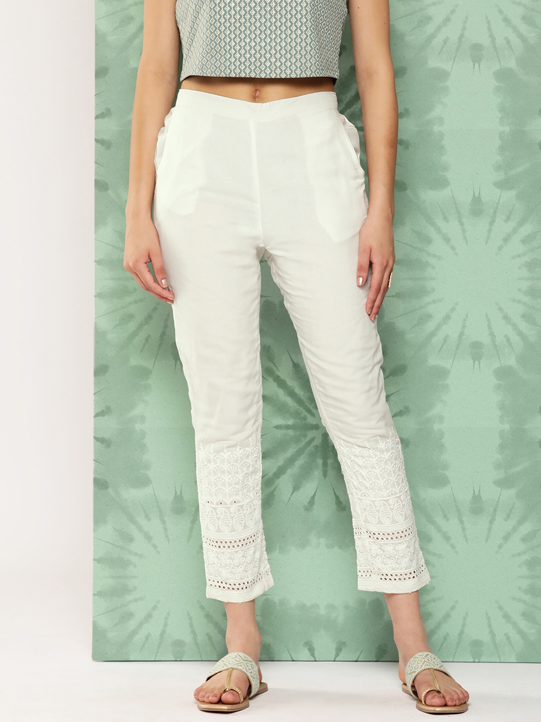 

Libas Women White Ethnic Motifs Embroidered Slim Fit Trousers