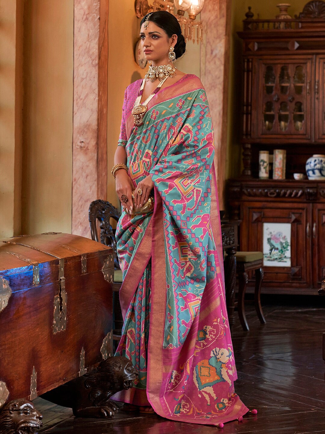 

Anouk Ethnic Motifs Woven Design Zari Silk Blend Pochampally Saree, Blue