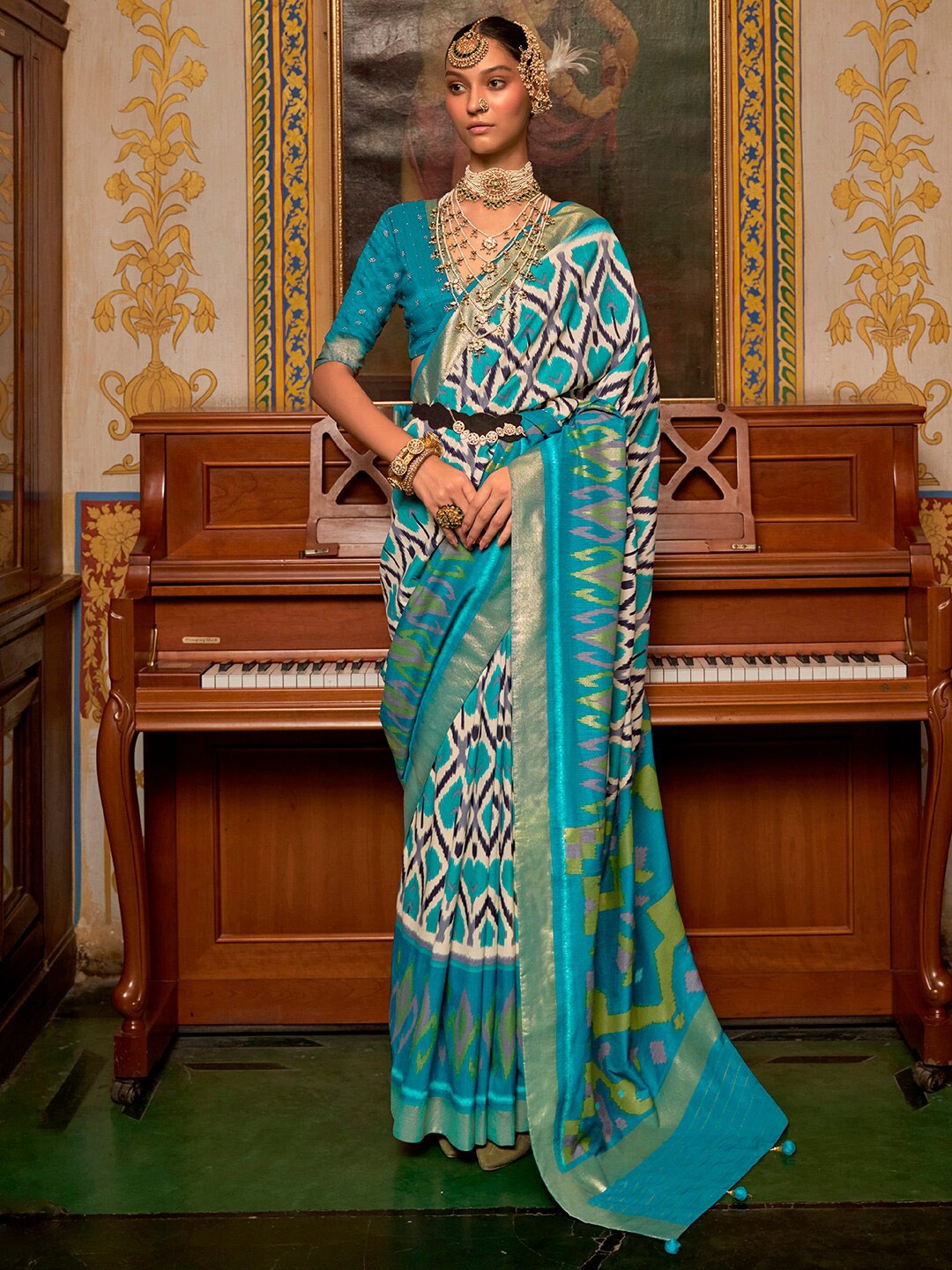 

Anouk Ethnic Motifs Woven Design Zari Silk Blend Ikat Saree, Cream