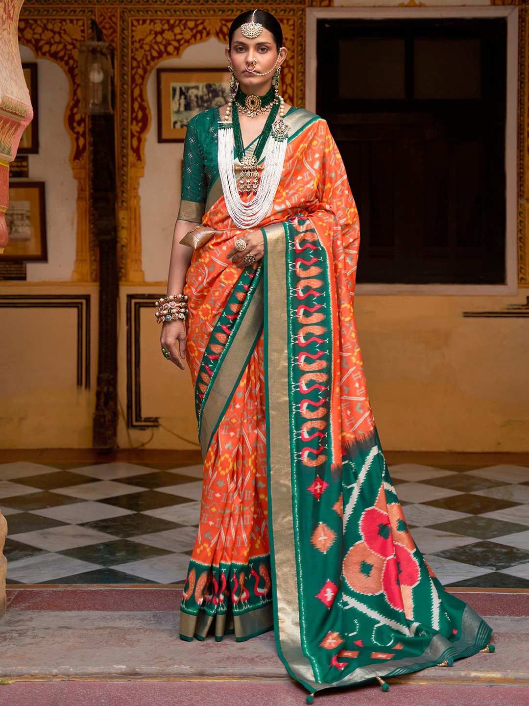 

Anouk Ethnic Motifs Woven Design Zari Silk Blend Ikat Saree, Orange