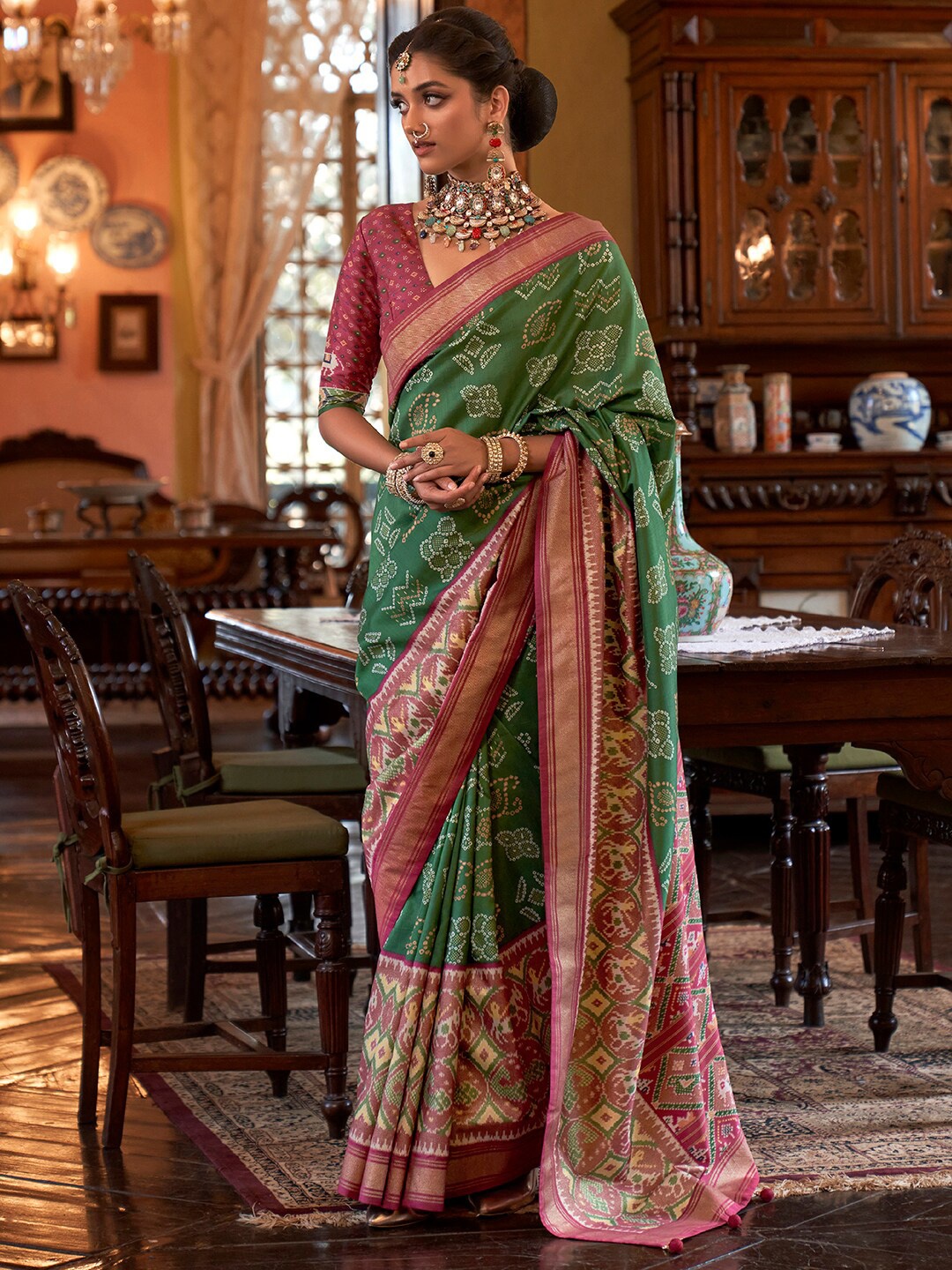 

Anouk Ethnic Motifs Printed Ikat Saree, Green
