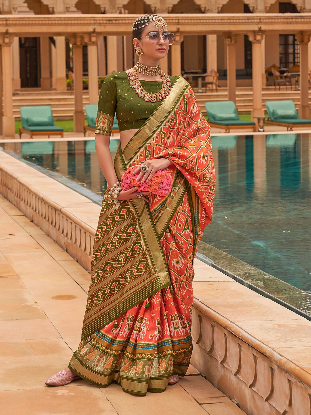 

Anouk Ethnic Motifs Zari Patola Saree, Orange
