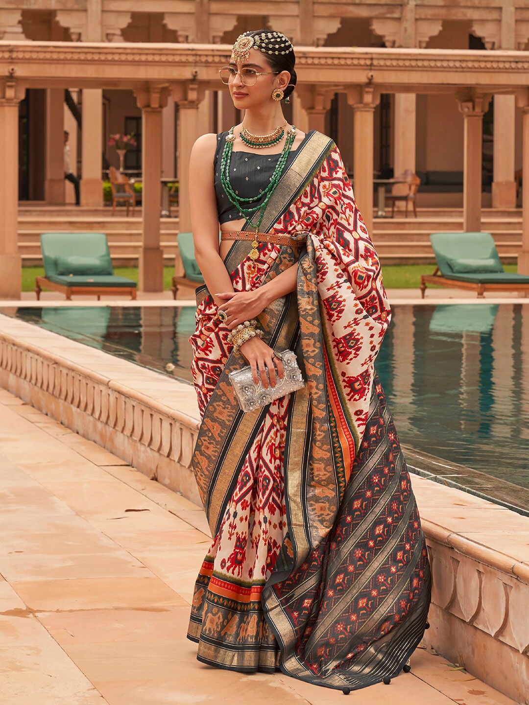 

Anouk Ethnic Motifs Woven Design Zari Patola Saree, Cream