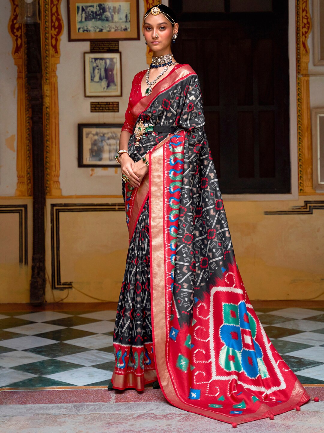 

Anouk Ethnic Motifs Zari Ikat Silk Blend Ikat Saree, Black