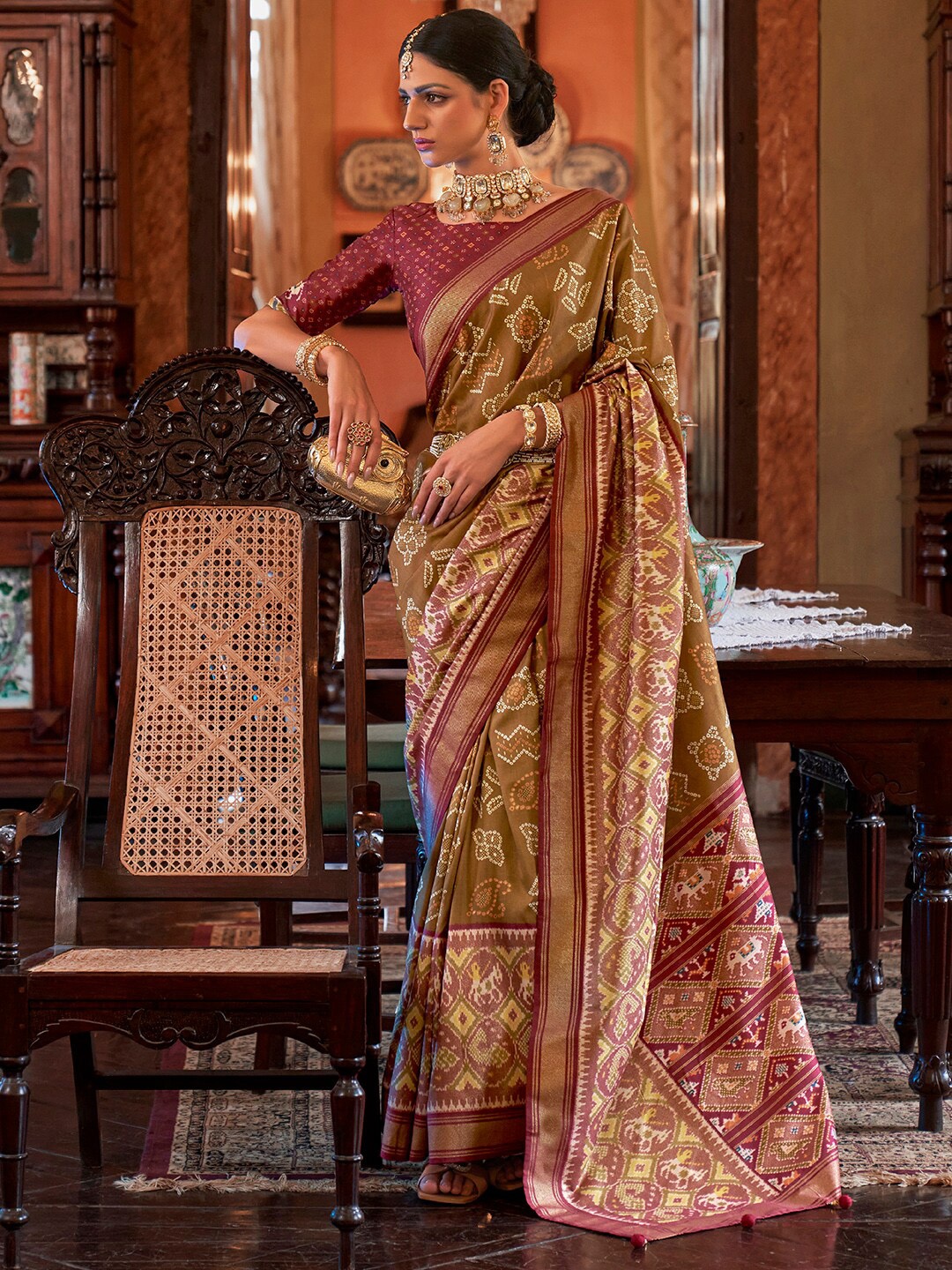 

Anouk Ethnic Motifs Zari Silk Blend Pochampally Saree, Olive