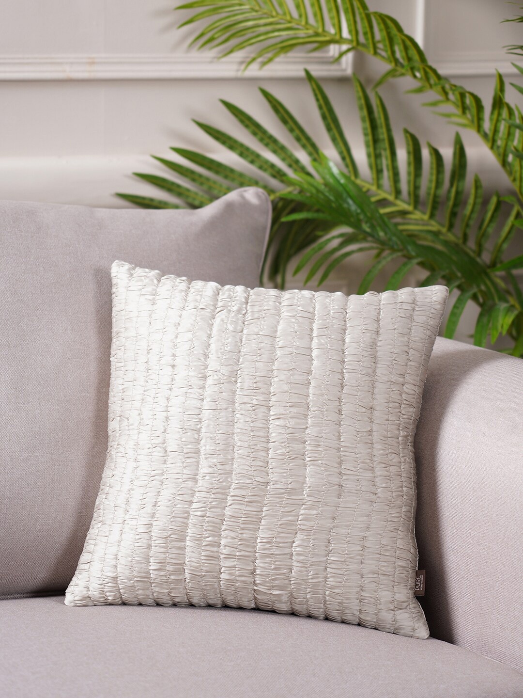 

Pure Home and Living Cream-Coloured Self Design Cotton Square Cushion Cover