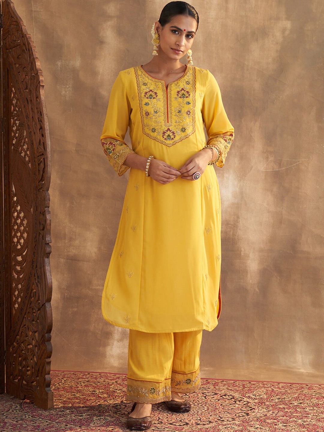 

Lakshita Women Ethnic Motifs Embroidered Kurta with Palazzos, Yellow