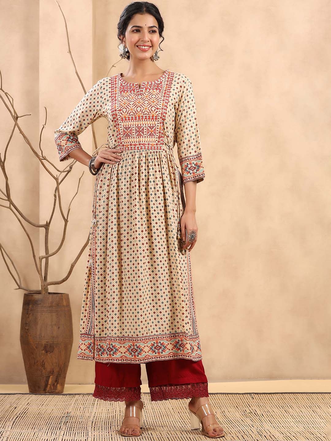 

Juniper Women Ethnic Motifs Printed Thread Work A-Line Kurta, Beige