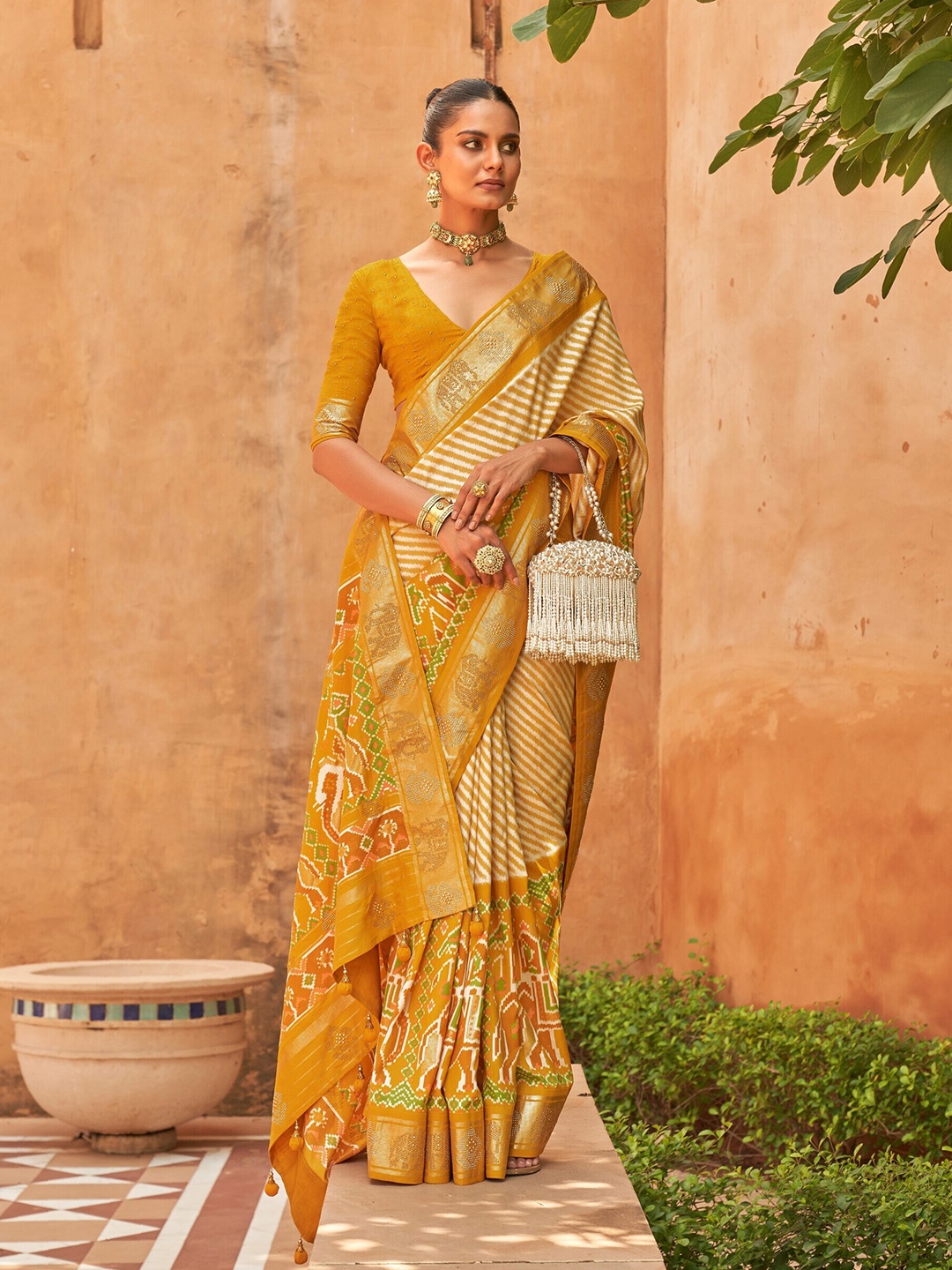

Mitera Leheriya Printed Zari Pure Silk Patola Saree, Mustard