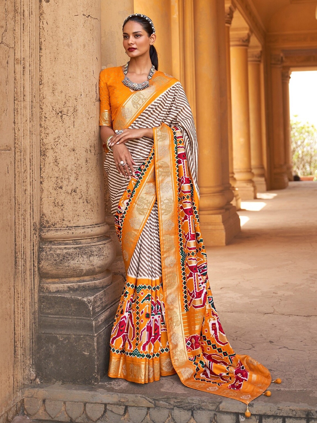 

Mitera Leheriya Printed Zari Pure Silk Patola Saree, Orange