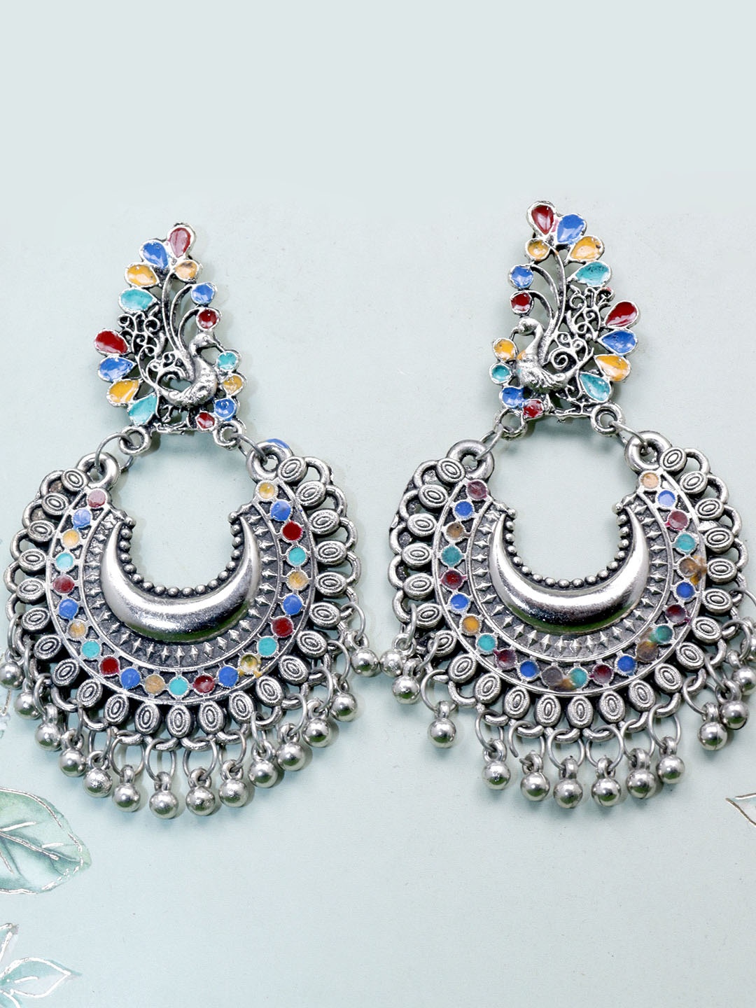 

VAGHBHATT Women Silver-Plated Peacock Shaped Chandbalis Earrings