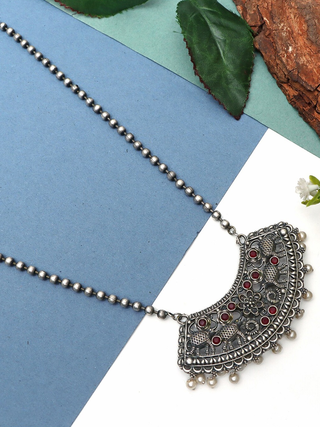 

Ozanoo Brass Silver-Plated Stone Studded Oxidised Necklace