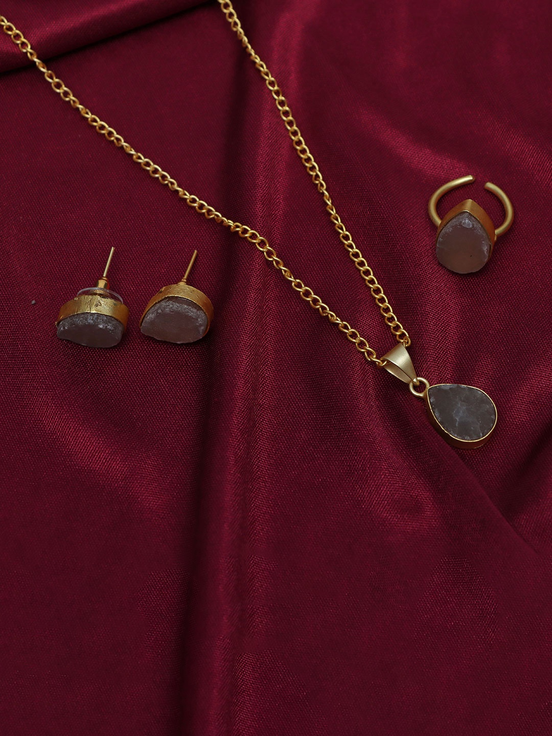 

Ozanoo Brass Gold-Plated Pendant Set With Ring