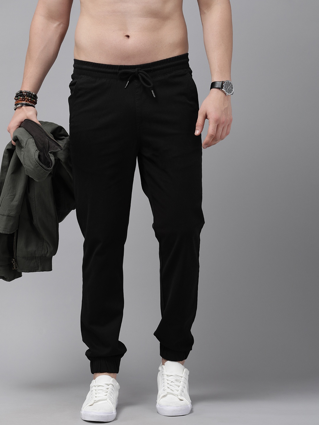 

Roadster Men Solid Regular Fit Low-Rise Plain Woven Flat-Front Joggers, Black