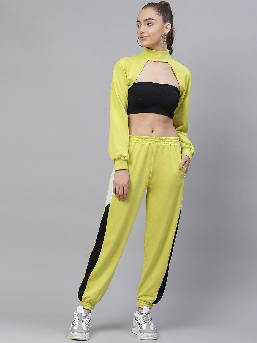 

Laabha Women Solid Tracksuit With Cutout Detail, Yellow