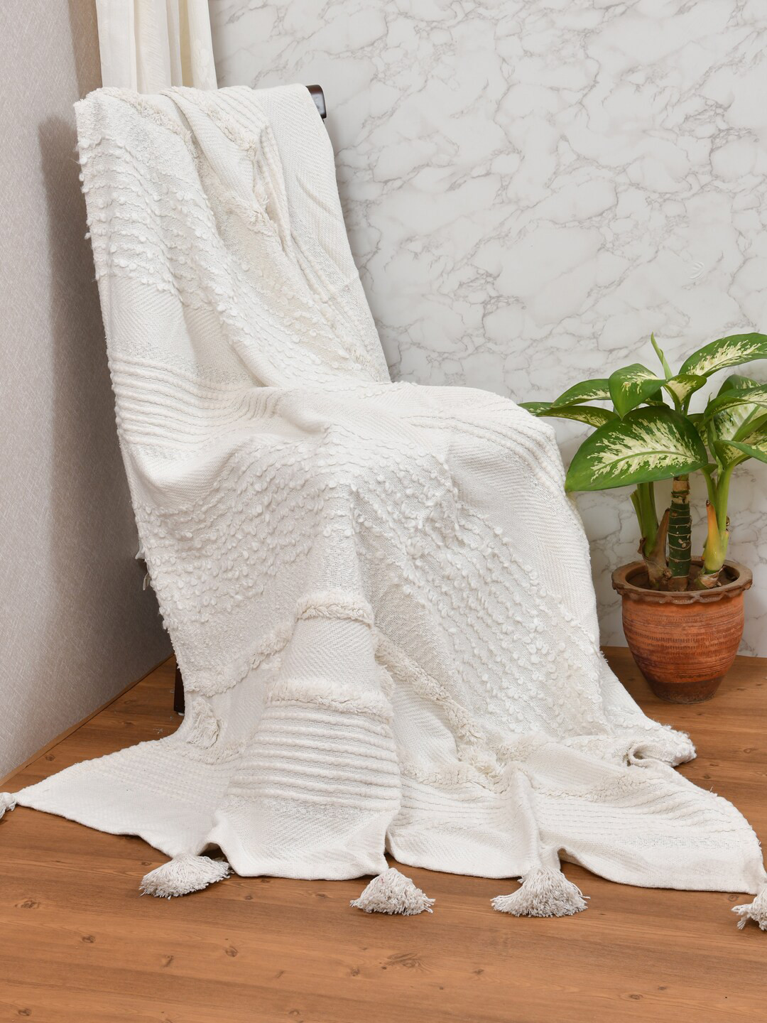 

Gulaab Jaipur White Self-Design Cotton Throws