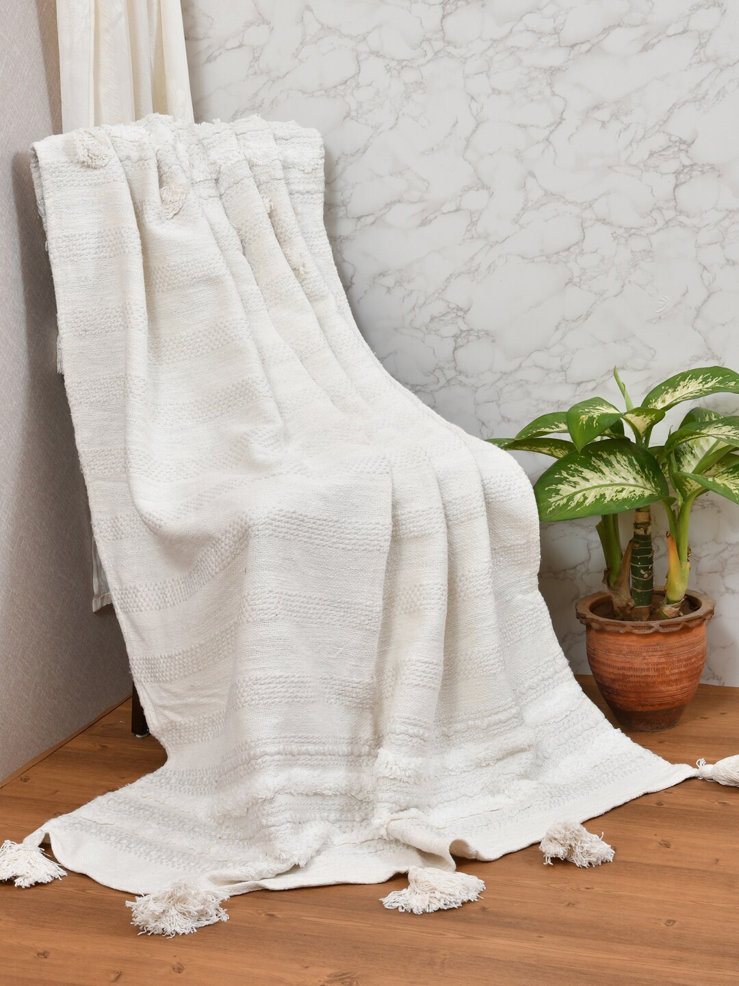 

Gulaab Jaipur White Self-Design Cotton Throws