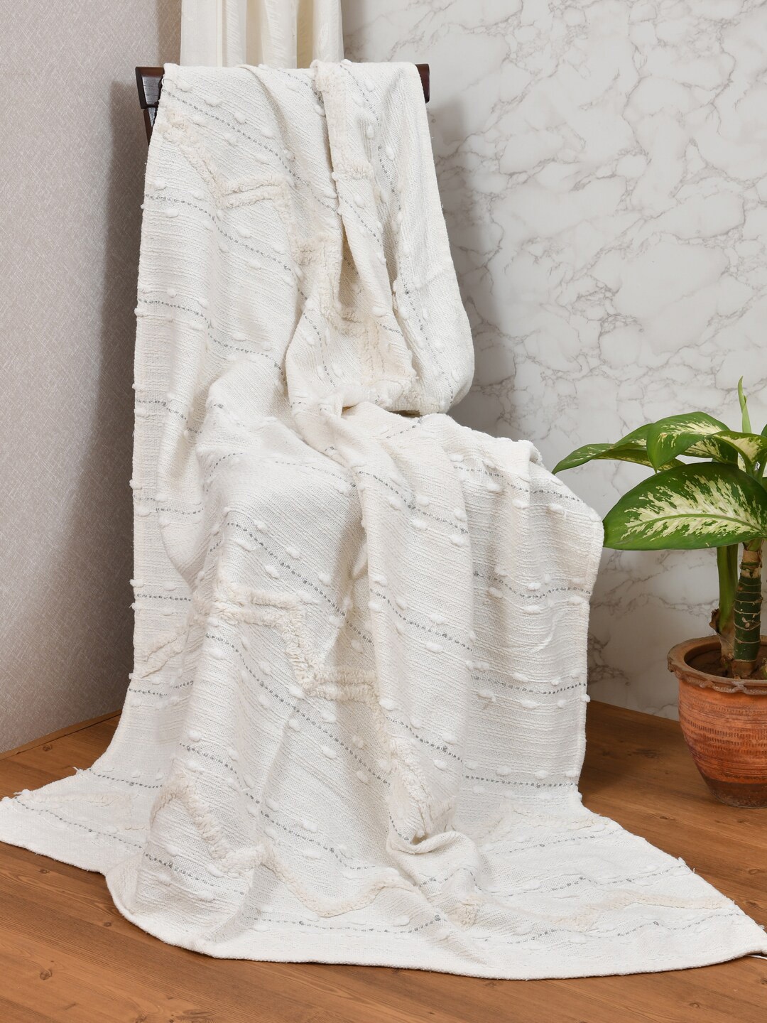 

Gulaab Jaipur White Self-Design Cotton Throws