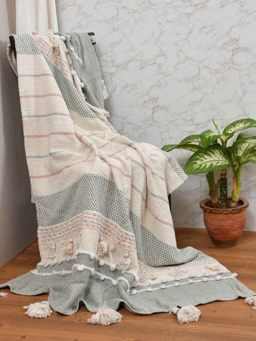 

Gulaab Jaipur Cream & Grey Self-Design Cotton Throws