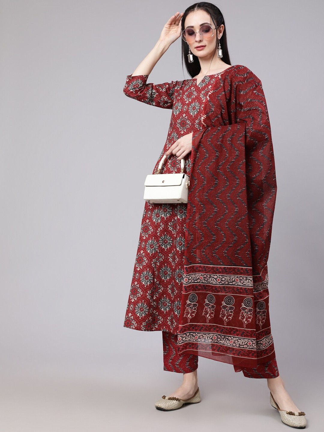 

THE NKS PLUS Printed Notch Neck Pure Cotton Anarkali Kurta with Trousers & Dupatta, Maroon