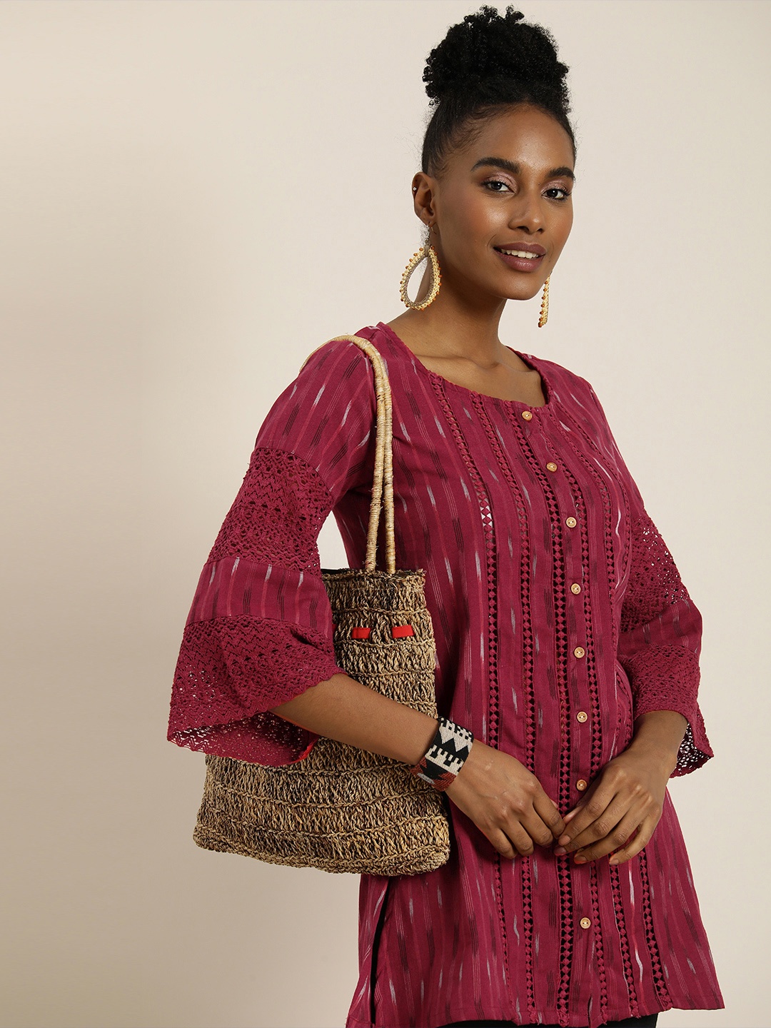 

Taavi Ikat Woven Design Flared Sleeves Kurti, Maroon