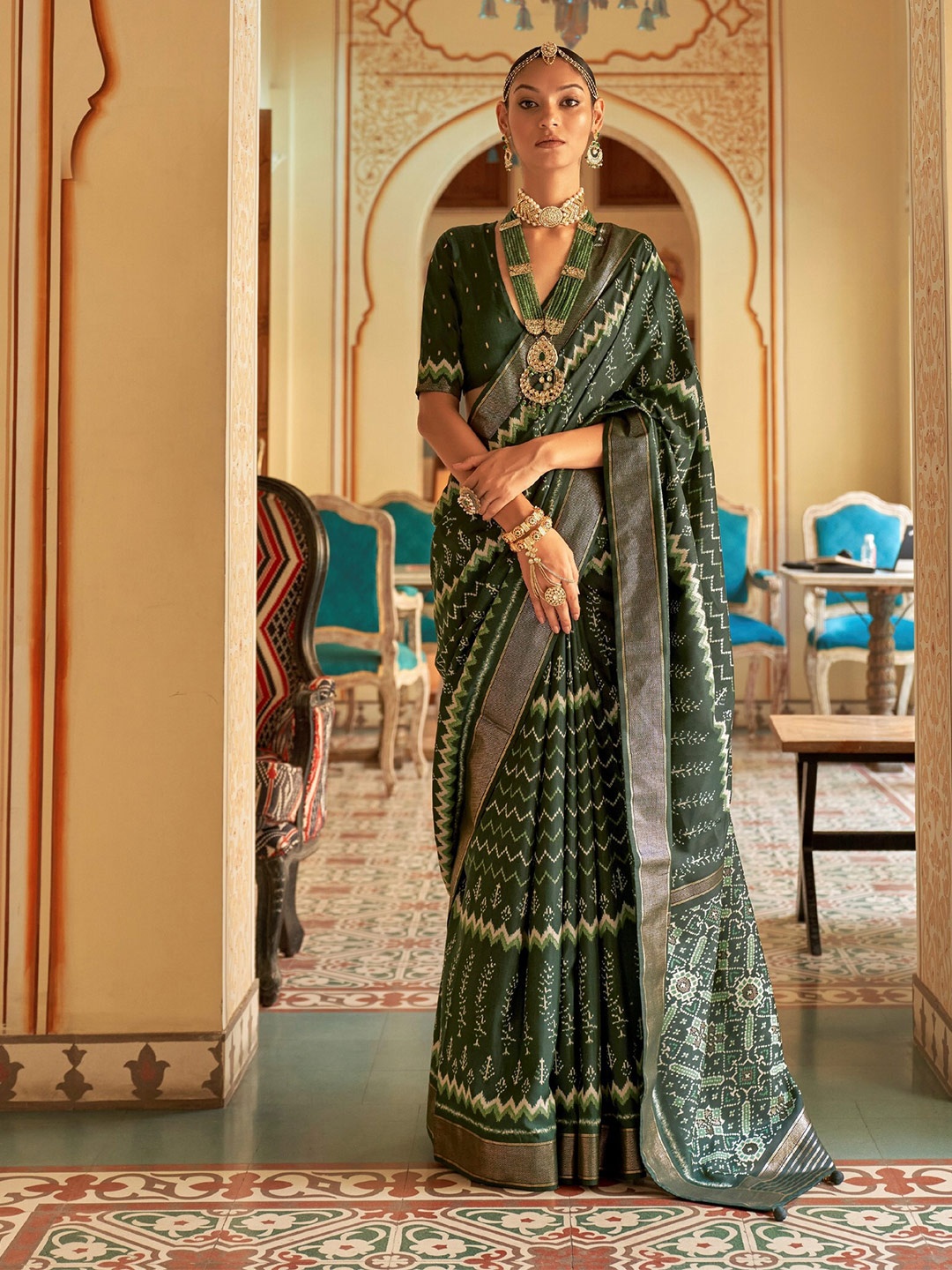 

Mitera Ethnic Motifs Zari Silk Blend Patola Saree, Green