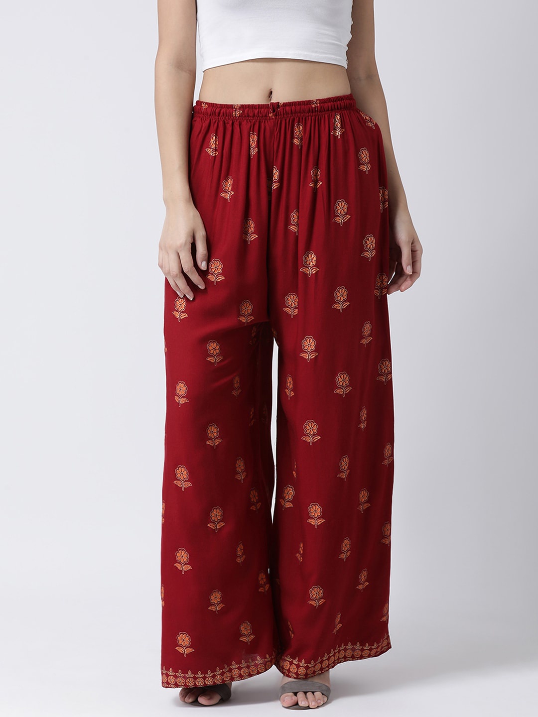 

Charitra Women Floral Printed Flared Palazzos, Maroon