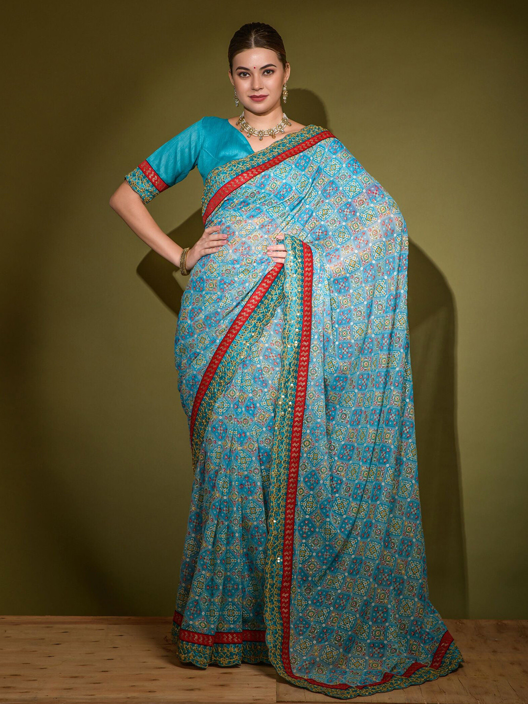 

Kalista Ethnic Motif Printed Embroidered Bordered Pure Georgette Saree, Blue