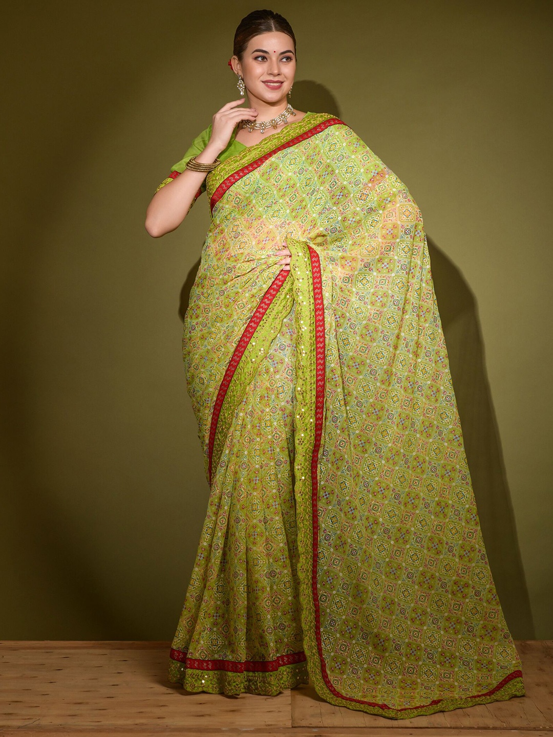 

Kalista Embroidered Pure Georgette Bandhani Saree, Green