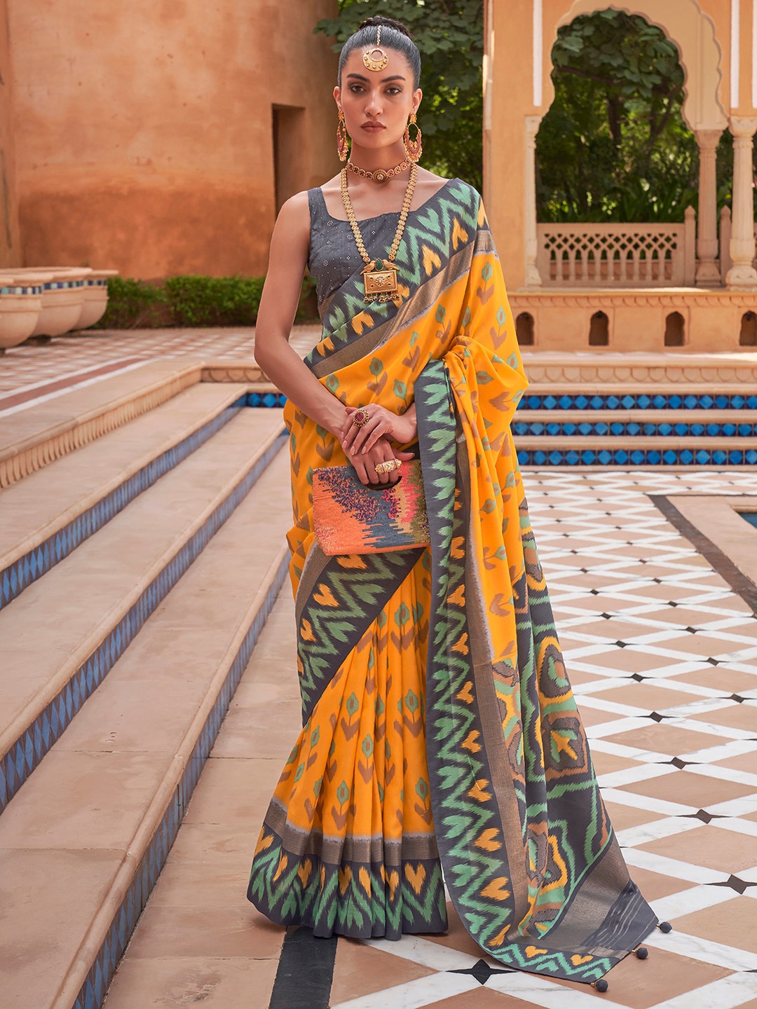 

Anouk Ethnic Motifs Printed Silk Blend Ikat Saree, Yellow