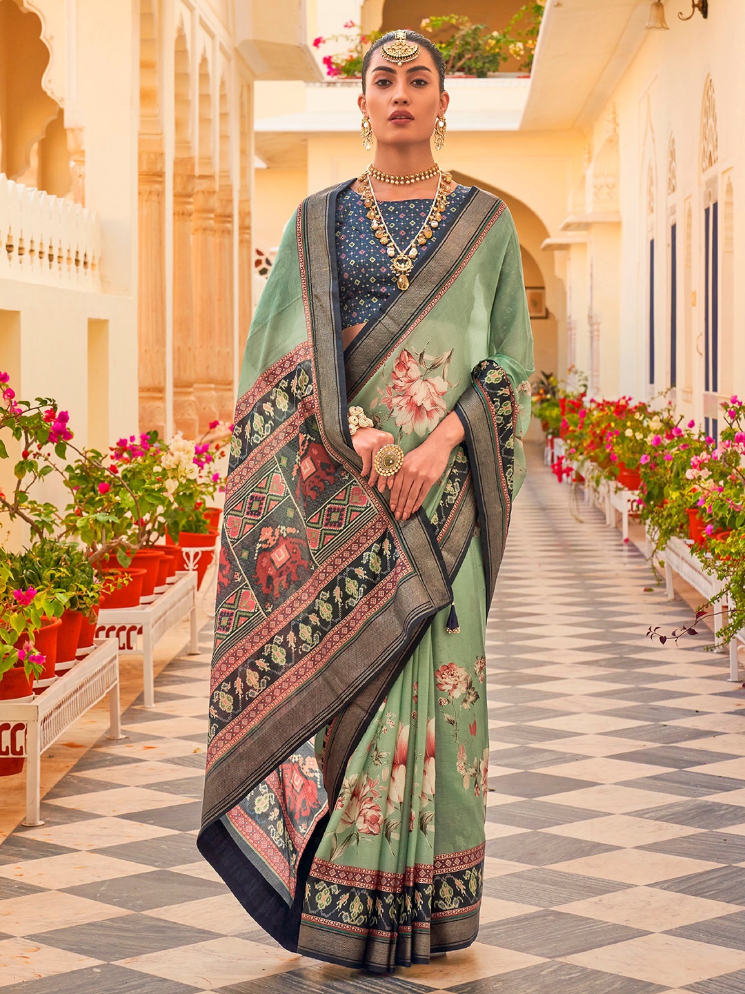 

Anouk Floral Printed Zari Silk Blend Patola Saree, Sea green