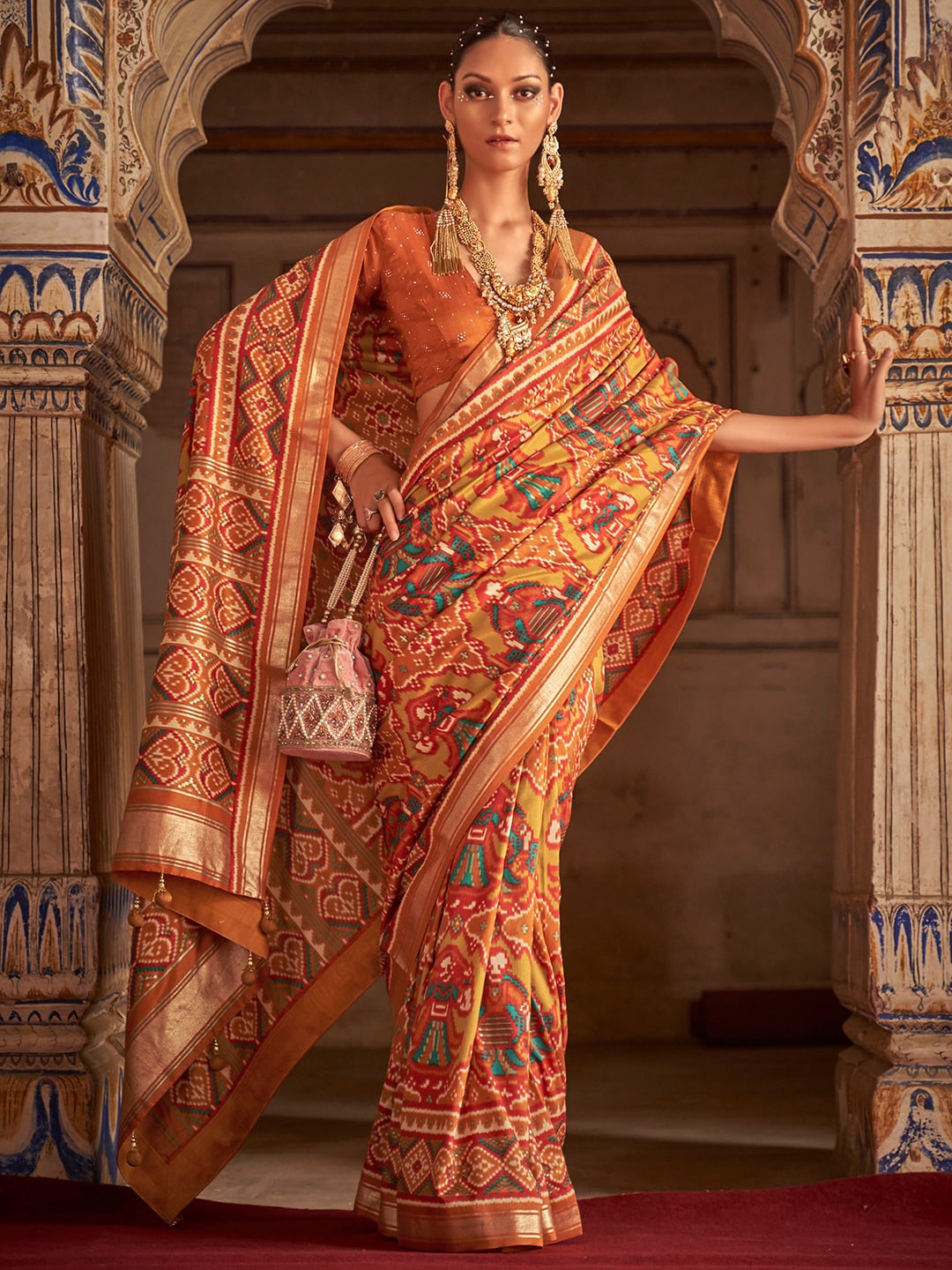 

Anouk Ethnic Motifs Printed Zari Silk Blend Pochampally Saree, Orange