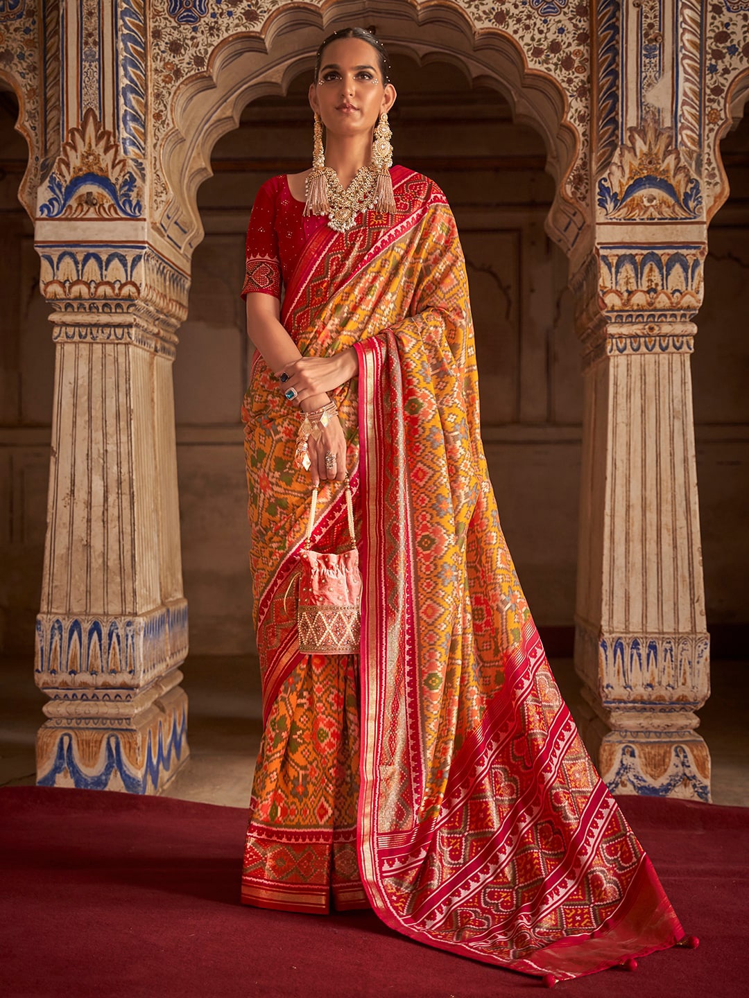 

Anouk Ethnic Motifs Printed Zari Silk Blend Pochampally Saree, Mustard