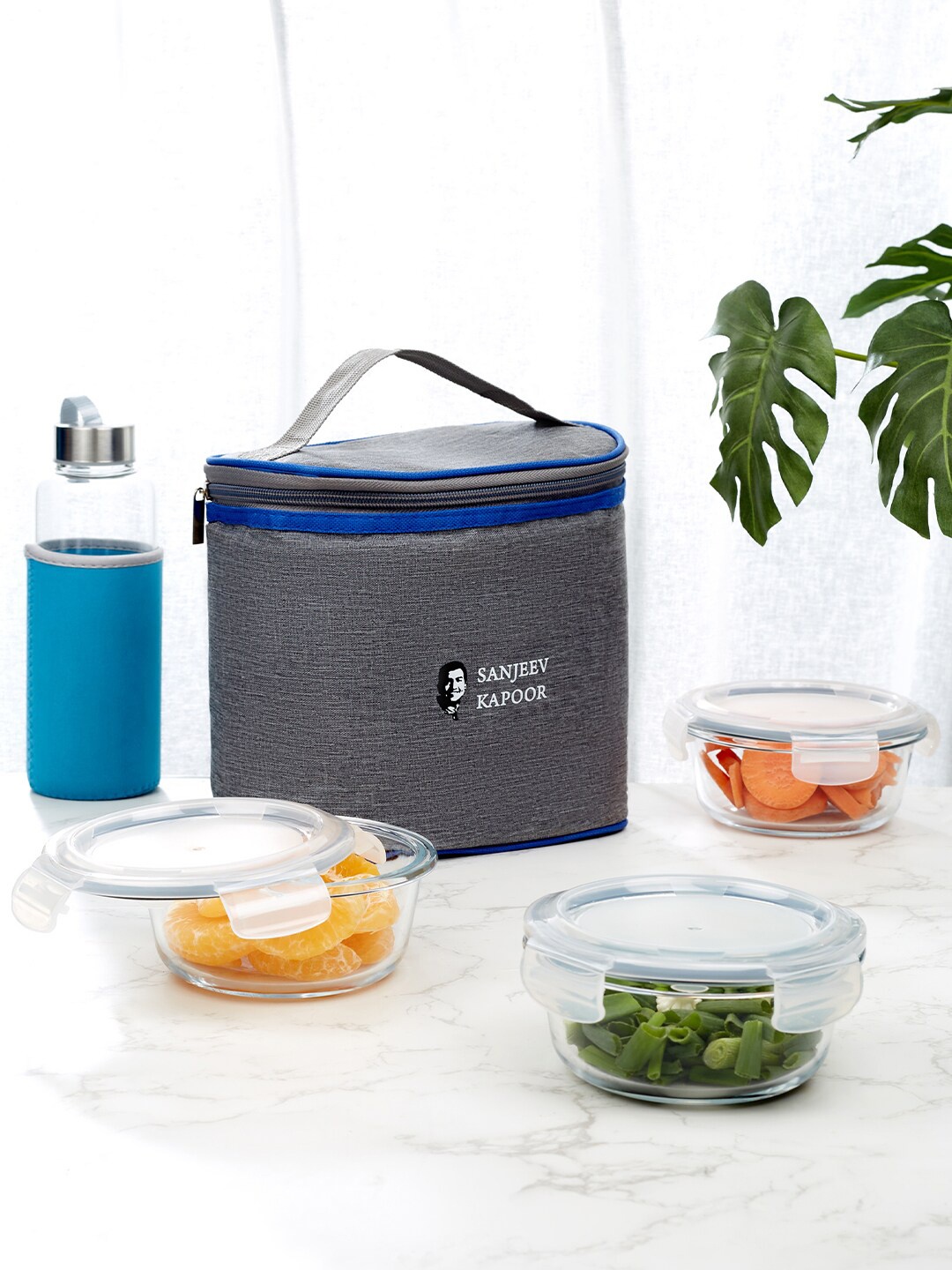 

HomeTown Delta Grey 3 Pcs Borosilicate Glass Microwave Safe Round Lunch box 400ml with Bag