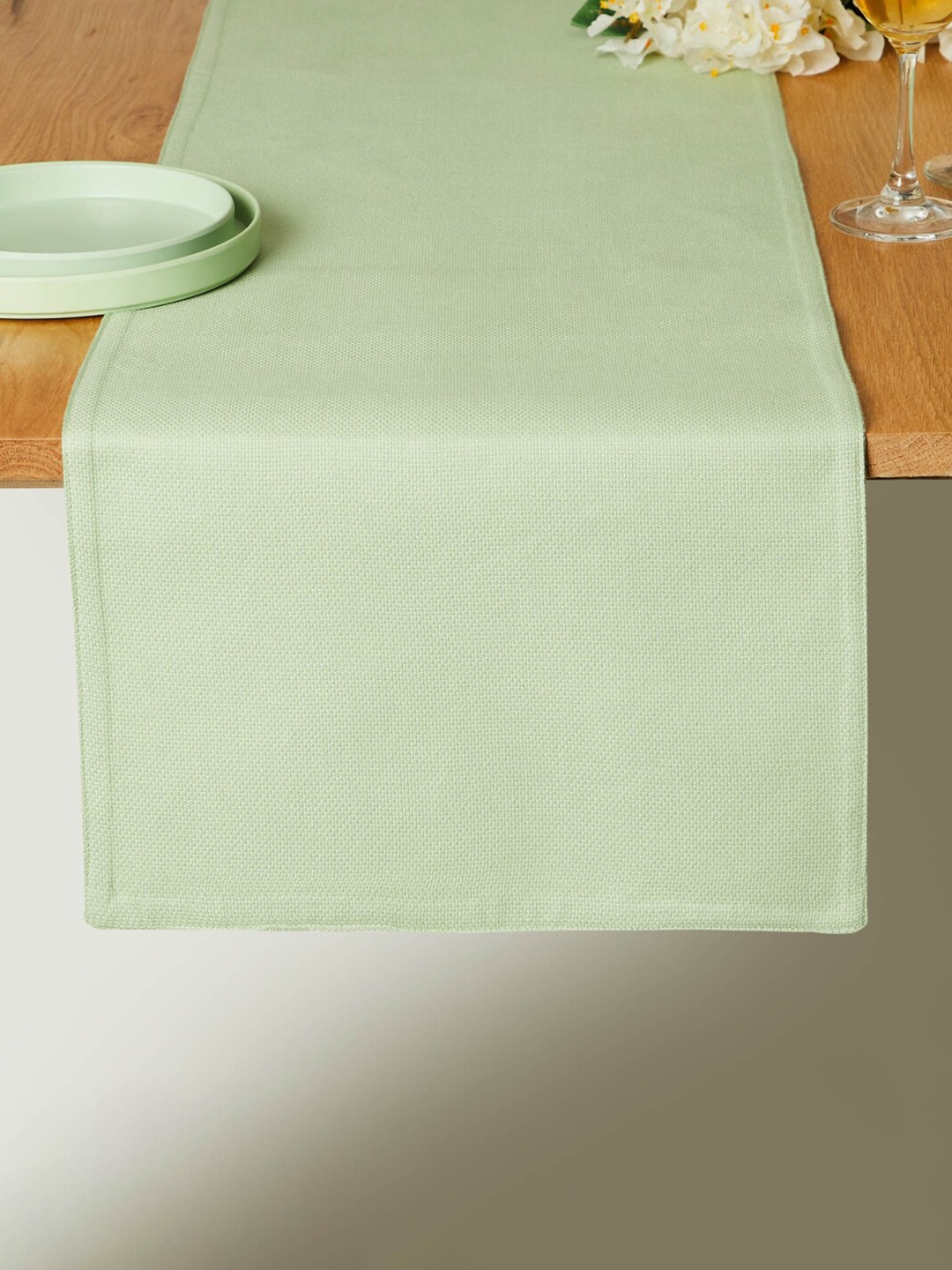 

Home Centre Soulful Pastels Green Textured Cotton Rectangular Table Runner