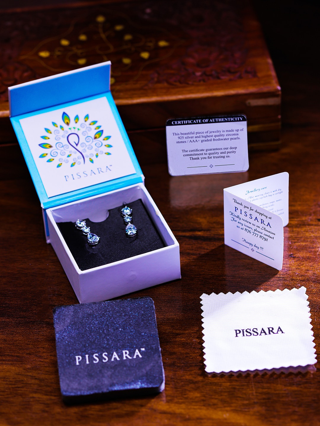 

Pissara by Sukkhi Rhodium-Plated Sterling Silver Contemporary Drop Earrings