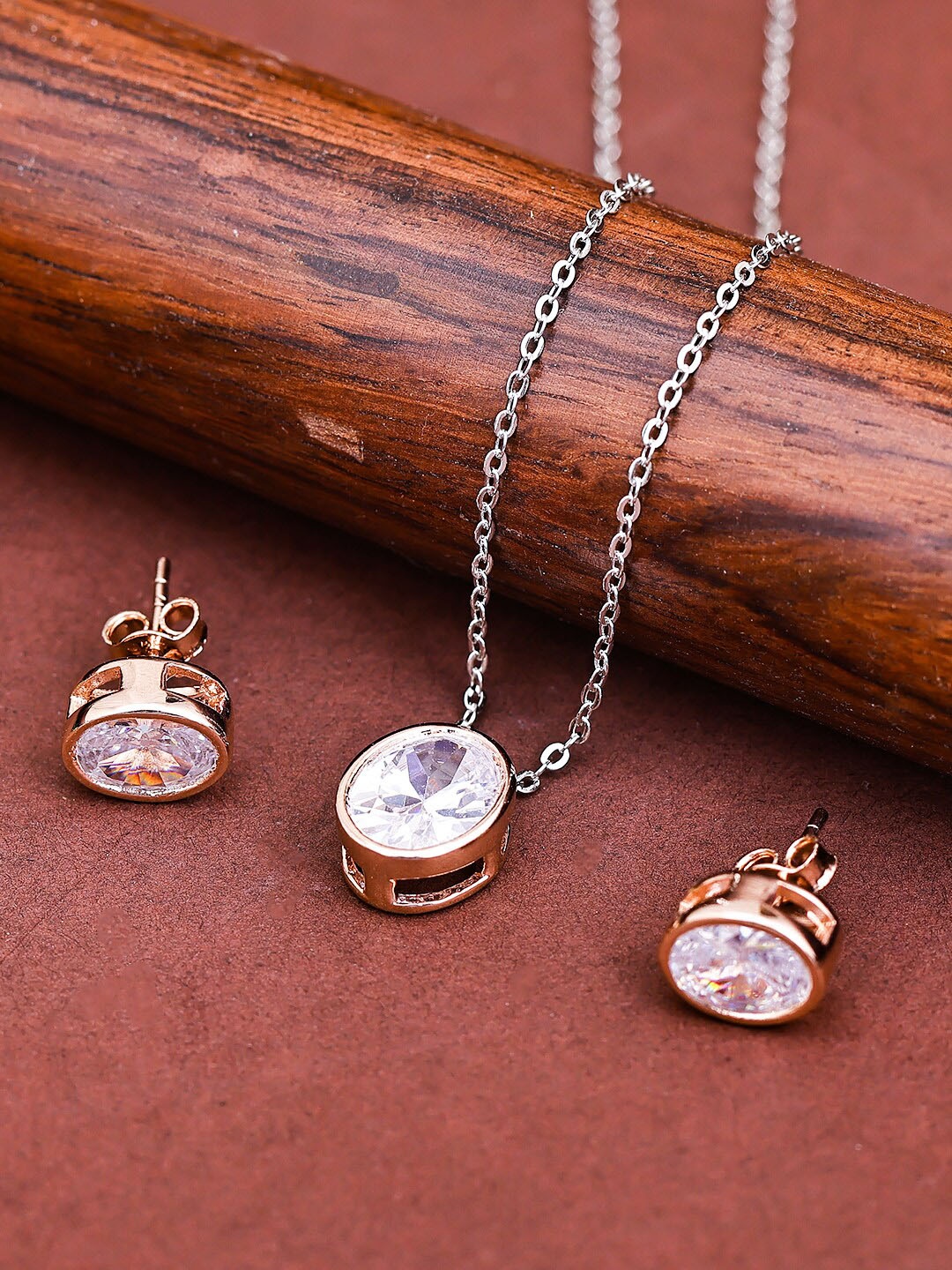 

Pissara by Sukkhi Rose Gold-Plated 925 Sterling Silver CZ Studded Oval Pendant & Earring Jewellery Set