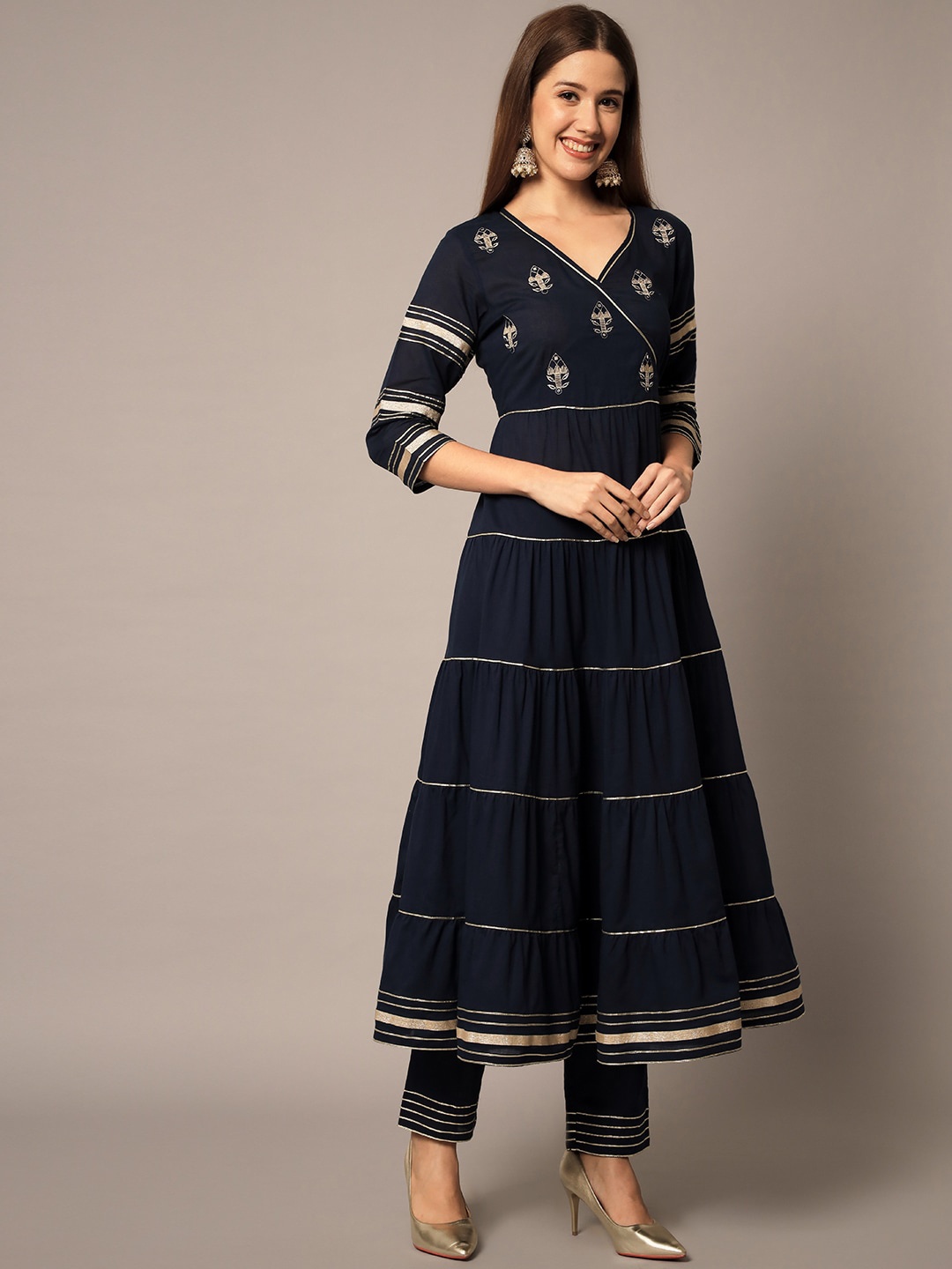 

Meeranshi Embroidered V Neck Zari Empire Kurta with Trousers & Dupatta, Navy blue