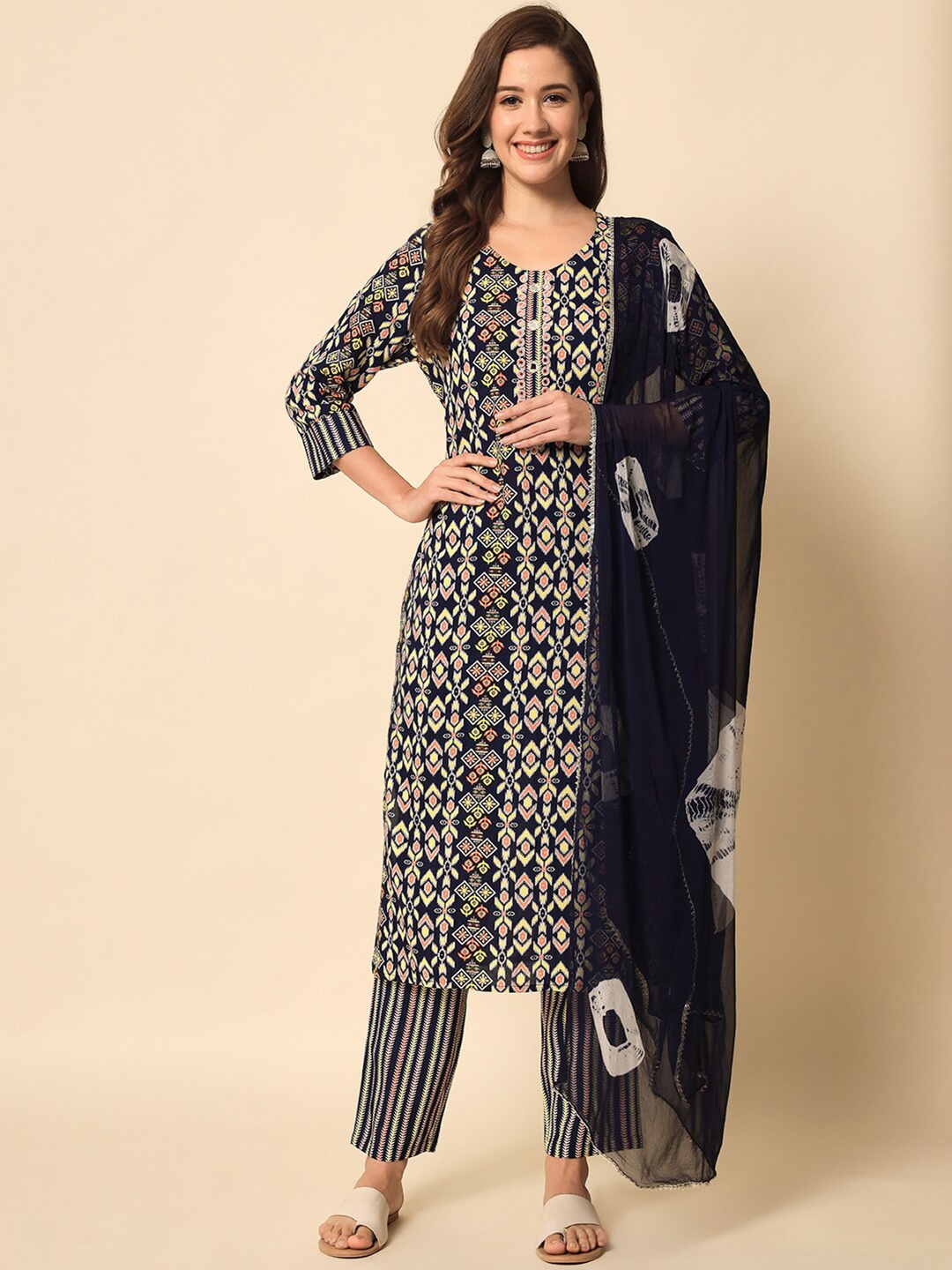 

Meeranshi Women Ethnic Motifs Printed Mirror Work Kurta with Trousers & Dupatta, Navy blue