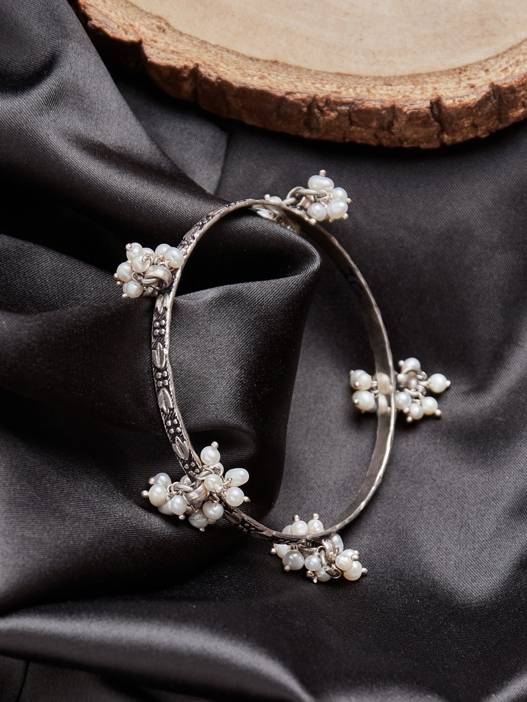 

Fabindia Silver-Plated Artificial Beaded Bangle