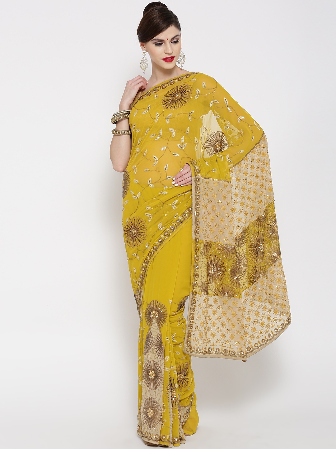 

Chhabra 555 Mustard Yellow Embellished Pure Georgette Saree